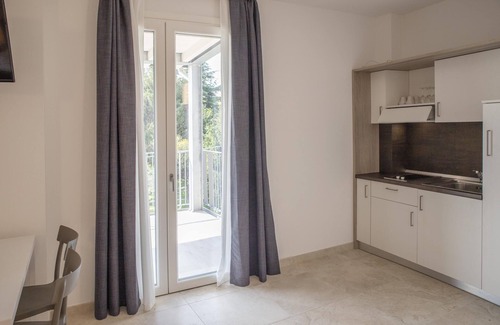 Pieve Vecchia Apartment | Junior Suite 1 with Shared Pool and Private Balcony