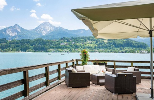 Finkenstein am Faaker See House | Juniorsuite mit Balkon - Das Inselhotel im Faaker See