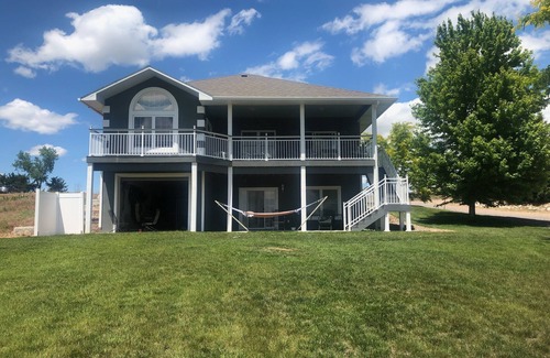 Lonergan House | Just steps to the beach. Lakefront Property with Endless Views.
