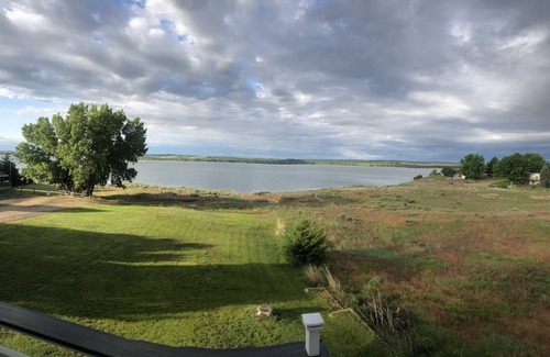 Lonergan House | Just steps to the beach. Lakefront Property with Endless Views.
