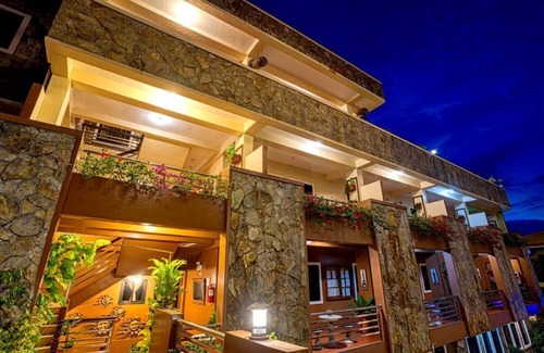 Estancia Apartment | Kalibo Haven: 3-Bedroom Getaway