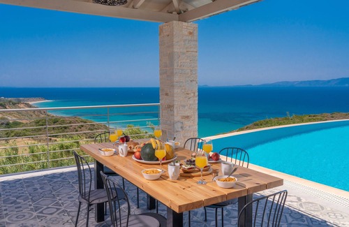 Eleios-Pronnoi Villa | Kaminia Blu A stunning luxury Villa Build above the golden sandy Kaminia Beach