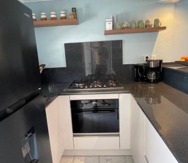 Willemstad Apartment | Kas di BaMi A-194 op Seru Coral Resort - Ruim appartement met groot zwembad en tropische tuin