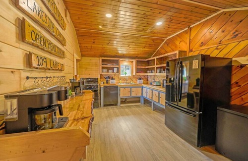 Northeast Somerset Cabin | Katahdin - Cabin 4 · Lawrence's Lakeside Cabins | 'Katahdin': Boat Dock + Kayaks