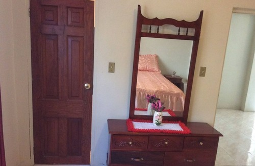 Ewarton Apartment | Kathy's Cool Getaway is located near to shopping and transportation.