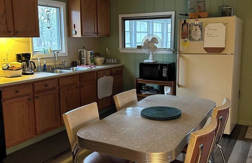 Fishertown Cottage | KD CottagesnPrivate 2-bedroom tan cottage on Dunnings Creek, in Bedford County