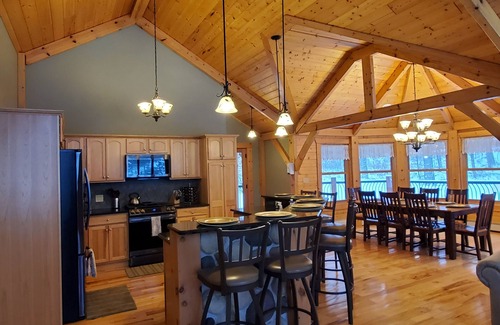 Dollar Bay House | Kemp's Rentals Luxurious Executive Retreat Portage Lake-Beach-Firepit & Pavilion