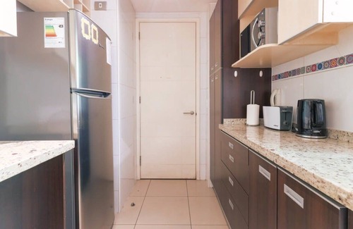 Apoquindo Apartment | Kennedy Art Summary: