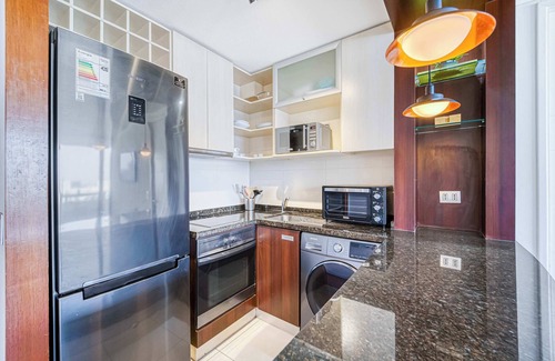 Apoquindo Apartment | Kennedy Retreat 1BR Pool, Parking & Smart TV