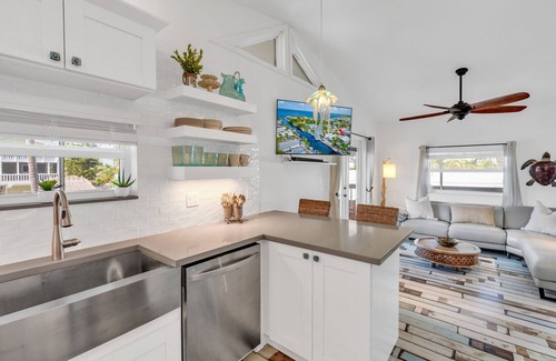 Twin Lakes House | Key Largo Canalfront Home w/Boat Lift, Swim Spa, Tiki Hut & Game Room