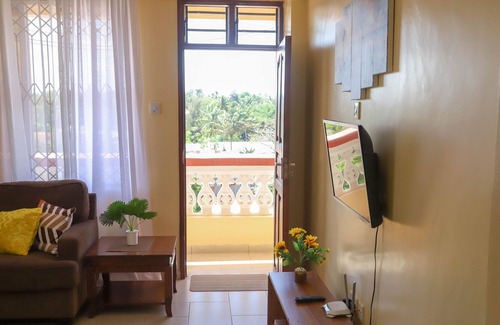 Kilifi Apartment | Kick back and relax in this calm, stylish pl