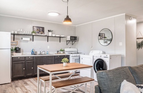 Abilene Condo | Kick back and relax in this calm, stylish space.