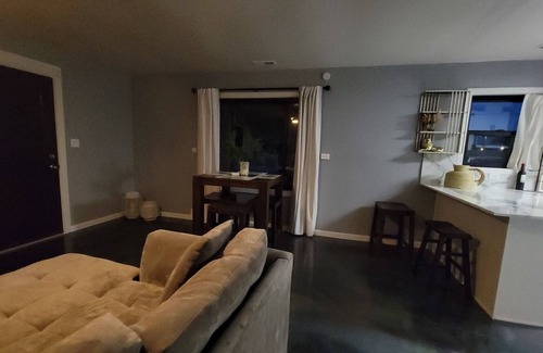 Prosser House | Kick back and relax in this warm and inviting clasic/modern atmosphere.