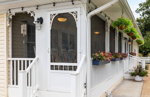 Kimmswick House | Kimmswick Porch Haven: Hot Tub, Cozy Fire Pit, & Fenced Yard!