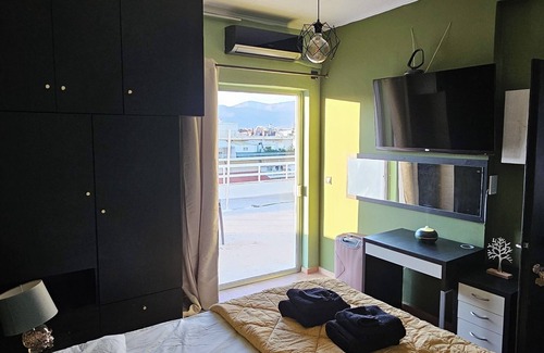 Nea Ionia Apartment | Kind Chloé - Deluxe Studionwith view of Athens from the 5th floor