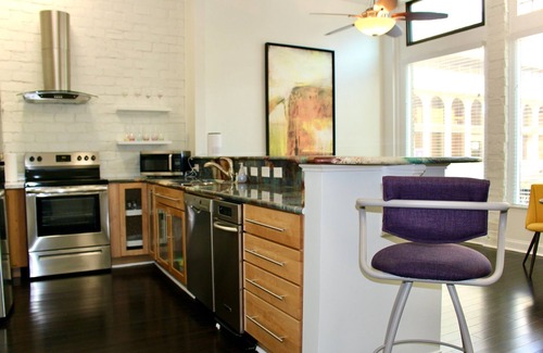 Downtown Greensboro Condo | King Bed and Huge Windows in the Heart of Downtown Greensboro