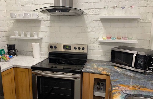 Downtown Greensboro Condo | King Bed and Huge Windows in the Heart of Downtown Greensboro