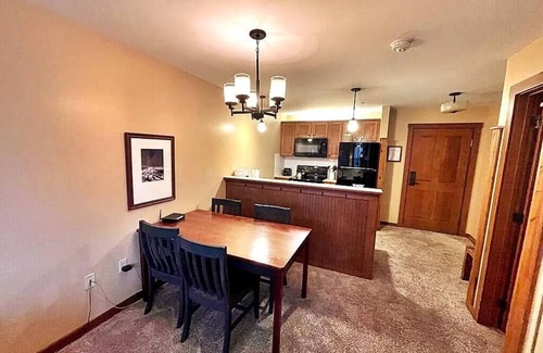 Snowshoe Apartment | King Bed Slope Side Retreat in Village Central