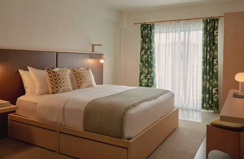 San Jacinto Hotel | King Room w/Balcony Overlooking Courtyard Pool + Rooftop Bar