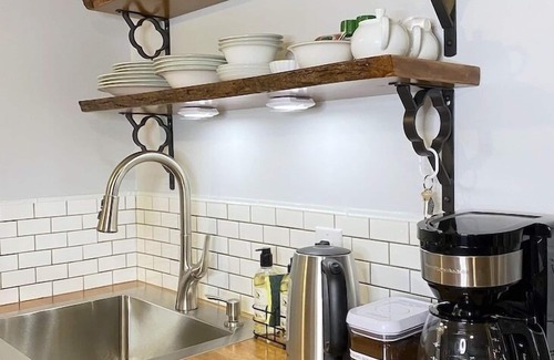 Black Mountain Apartment | King sized Guest Suite with Private Hot Tub, In Town location.