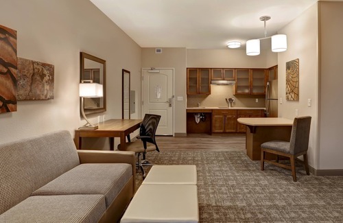 Overland Park Condo | King Suite. Free Breakfast. Pool. Shared BBQ.