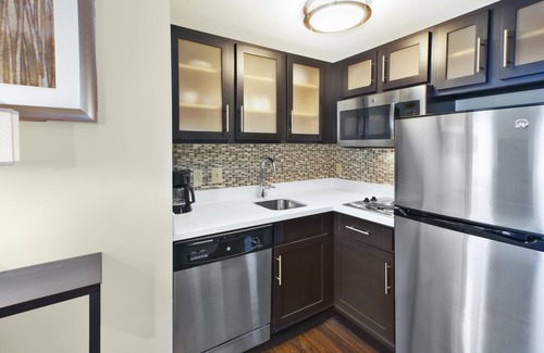 Mayfield Heights Condo | King Suite with a Jacuzzi Tub | 24-Hour Business Center, Fitness Center + Free Daily Breakfast