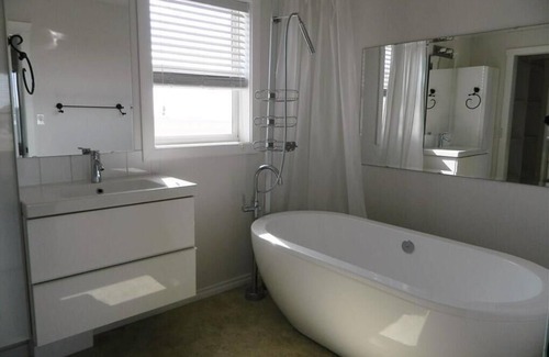 Three Hills House | King Suite with FireplacenUpper Floor Suite