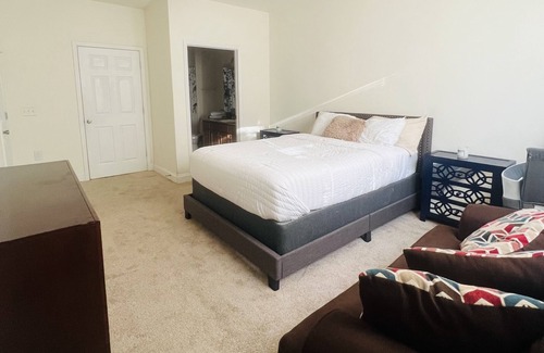 Charlotte Apartment | King suite with private bathroom. 2 bed & 2 full bath. Family and baby friendly.