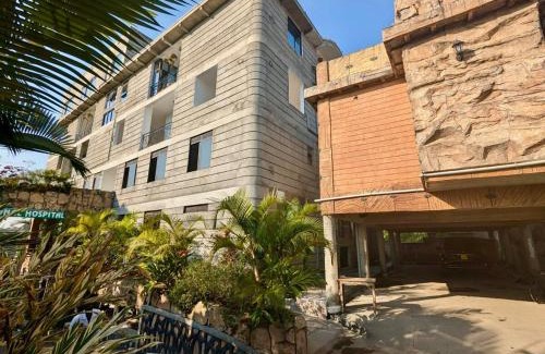 Fort Portal Apartment | Kirungi Vacation Homes - Large Bamboo Studio room with access to top roof