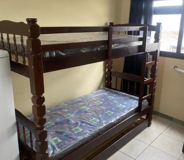 Aviacao Apartment | Kitnet Praia Grande - Aviação 500 metros da praia AR CONDICIONADO - GELADEIRA - FOGÃO - SOFÁ CAMA - WIFI