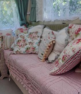 Grade House | KItty unique 60s caravan set in pretty garden