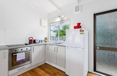 Red Beach House | Kiwi to its Core, Bach Perfect WiFi Netflix