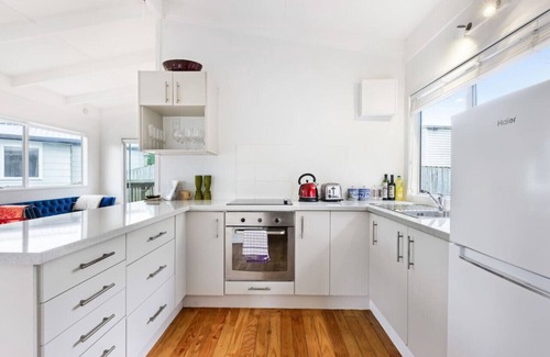Red Beach House | Kiwi to its Core, Bach Perfect WiFi Netflix