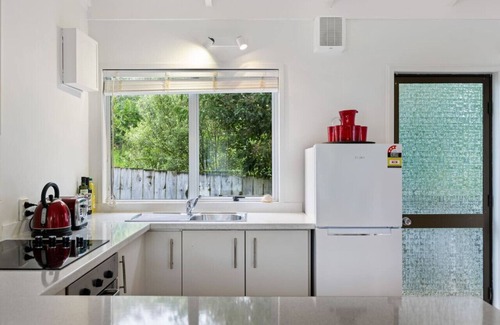 Red Beach House | Kiwi to its Core, Bach Perfect WiFi Netflix