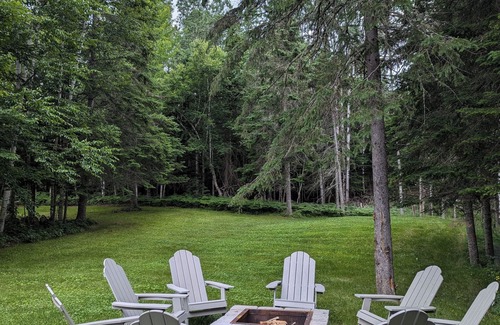 Oquossoc House | Knotty Pine Home- 2 Min Walk to Lake and Dock