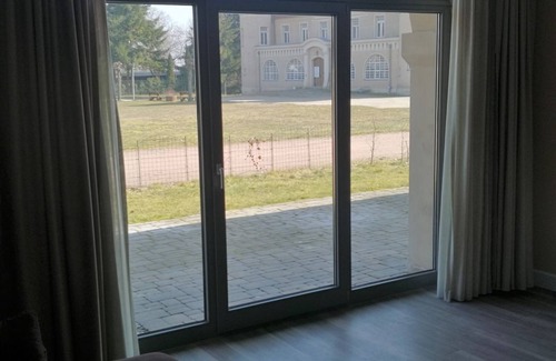 Stolpe Apartment | Kolibri RE-05 - Cozy vacation apartment The Remise Kolibri RE-05 in a rural setting.