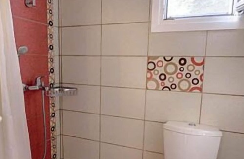 Agios Georgios Pagon Apartment | Kostas Studio 1 - the beach, small supermarkets and restaurants are within easy walking distance