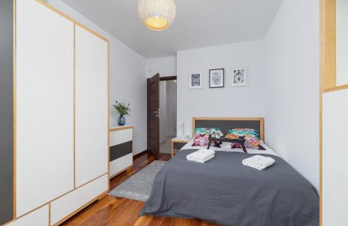 Krakow Apartment | Kraków Błonia Apartment with Balcony by Noclegi Renters