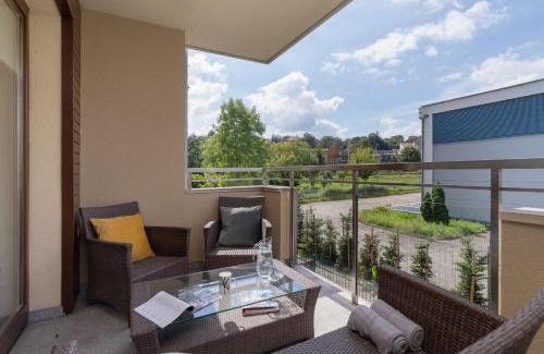 Krakow Apartment | Kraków Błonia Apartment with Balcony by Noclegi Renters