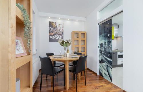 Krakow Apartment | Kraków Błonia Apartment with Balcony by Noclegi Renters