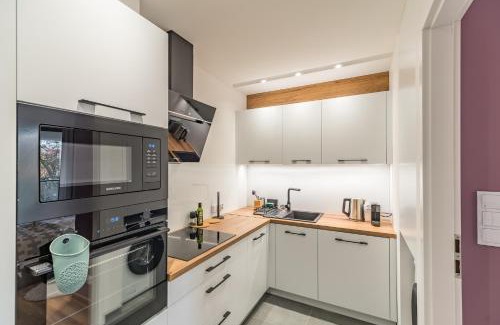 Krowodrza Apartment | Kraków Business Suite - 47m2, Balcony and Parking by Rentujemy