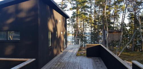 Grisslehamn Cabin | Kvarnsands Strandstugor/Kvarnsand Beach Lodges