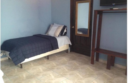 Corozal Hotel | La Delphina Bed and Breakfast Bar and Grill Family Room