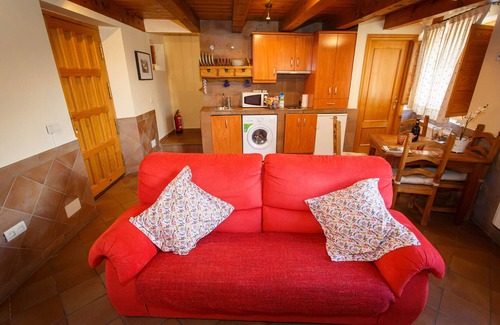 Pinuecar House | La Fragua is a beautiful little house with a gable roof built in stone and wood