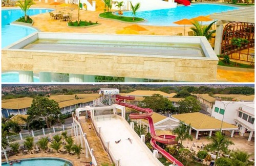 Jardim Paraiso Apartment | LACQUA DI ROMA - WAVE POOL AND KITCHEN WITH STOVE