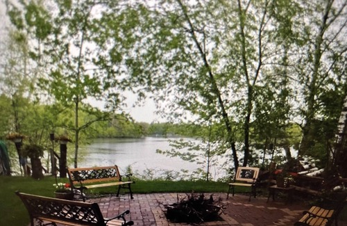 Holcombe House | Lake cabin on Holcombe flowage. Loft views, fire pit, and nearby hiking.