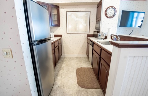 Boyne City Condo | Lake Charlevoix at Your Door | Ground-Level Balcony Escape | Private Beach