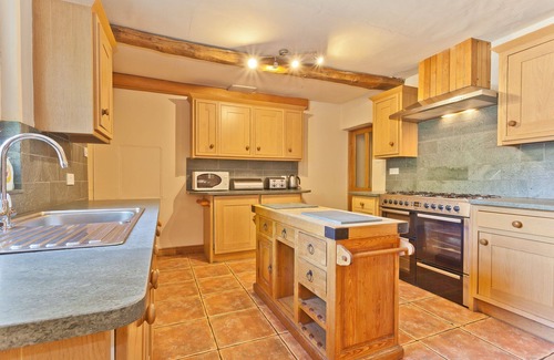 Coniston Cottage | Lake District village cottage sleeping 16 guests in 8 bedrooms with 3 hot tubs