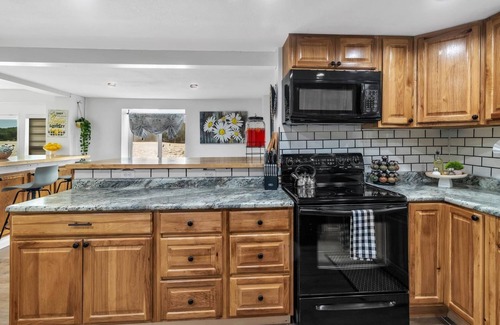 Cloverdale Cottage | Lake front cottage with private beach and docks!