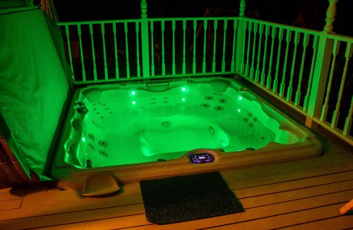 Eden House | Lake front home with in-deck outdoor hot tub and spectacular lake views!